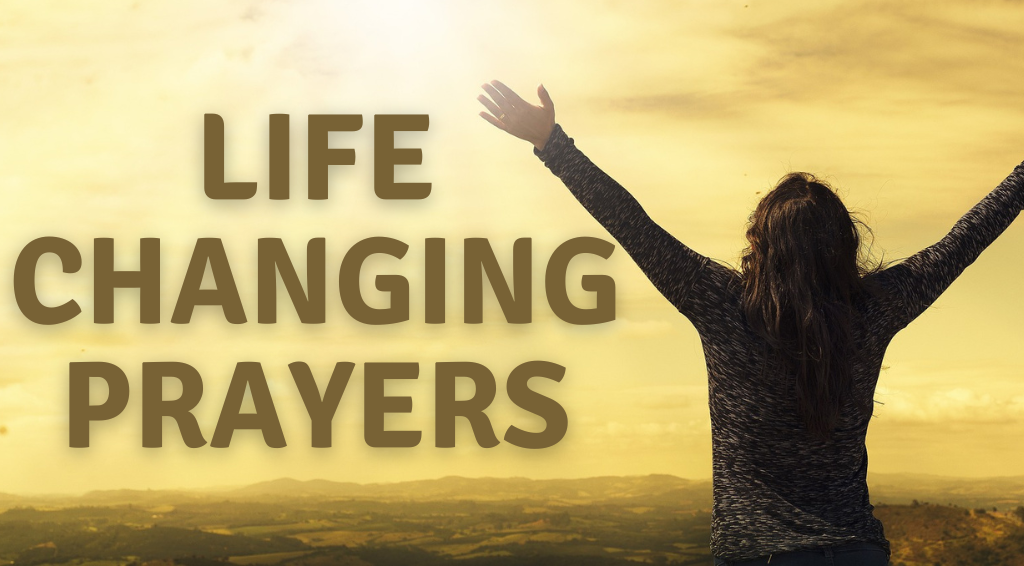 Lady praying with arms stretched wide